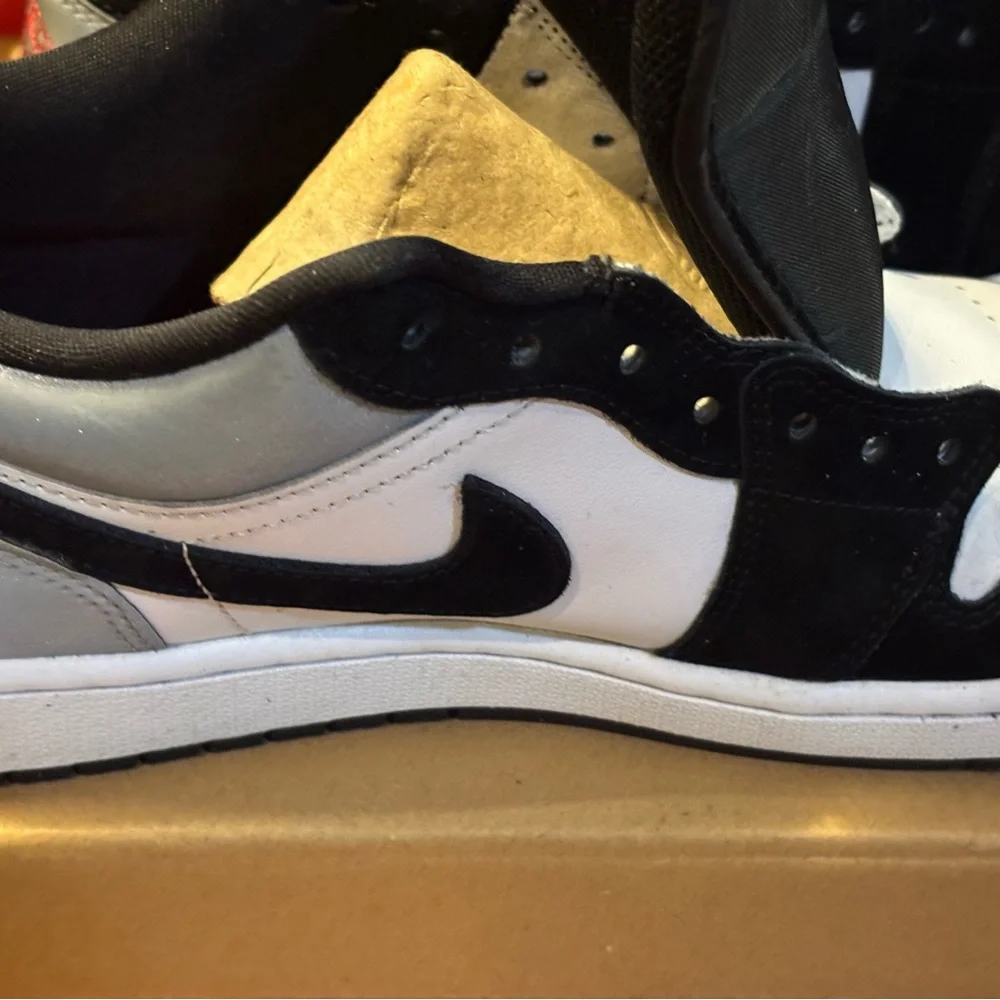 Jordan Black and White Athletic Shoes with Red Accent